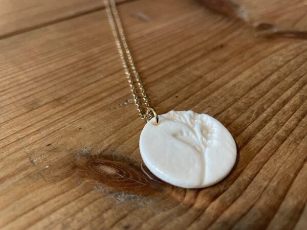 Collier rond impression fleur