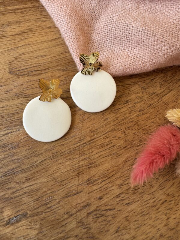 Boucles d’oreilles rond et sa fleur doré